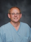 Dr. Hollis C. Sigman