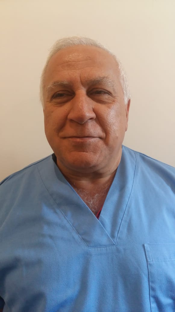 Dr. Paul Gharios